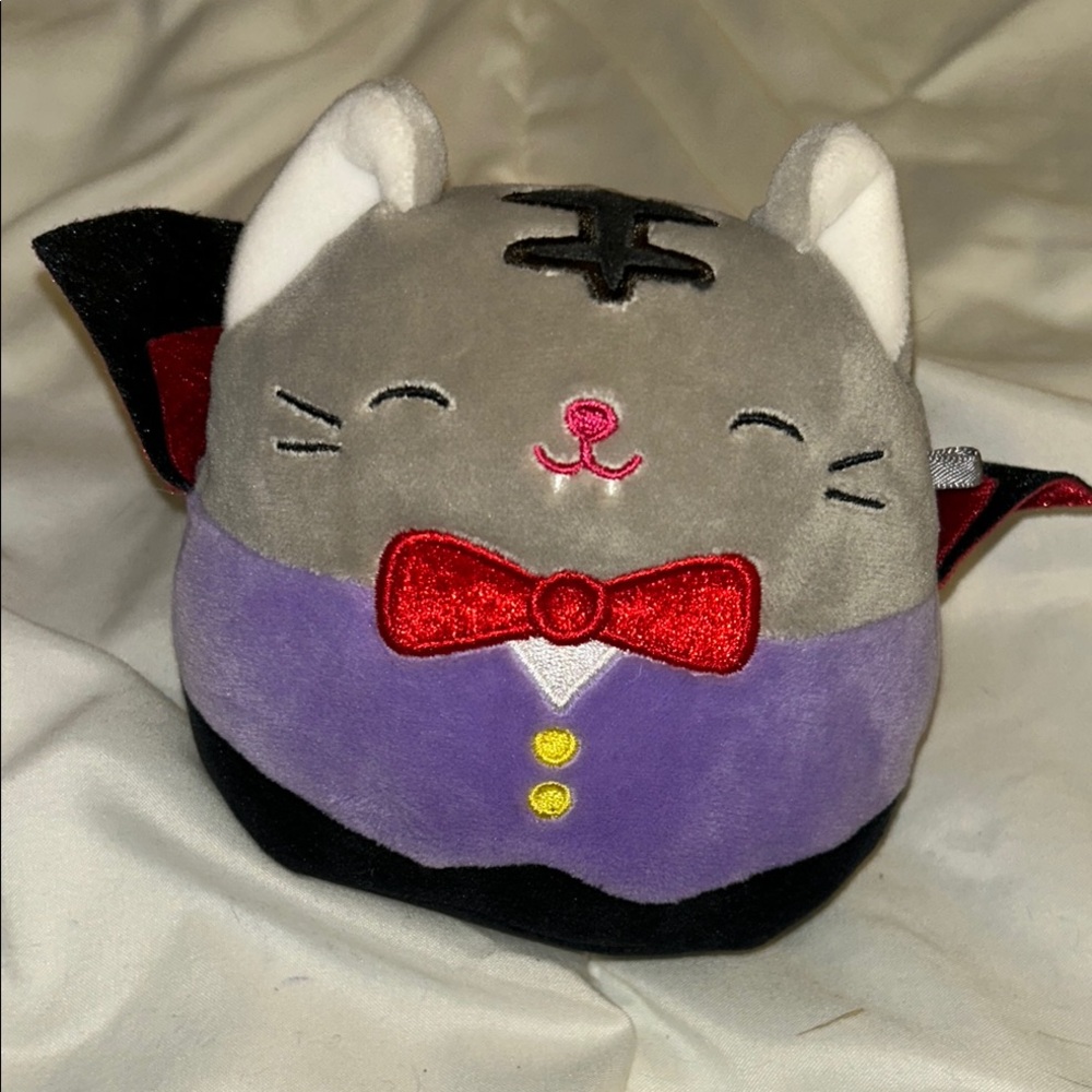 Squishmallows Gray and Purple Cat Plush with Red Bow Tie
